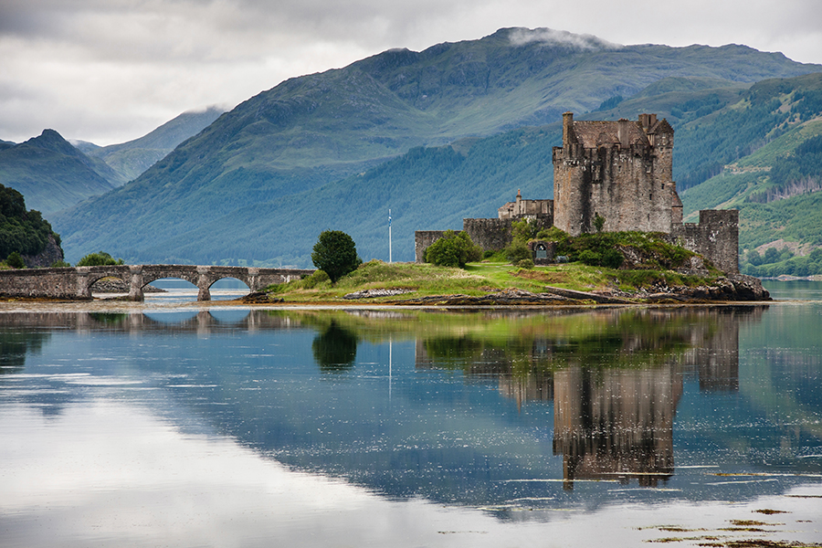 Photograph of Scottish castle and surrounding grounds.